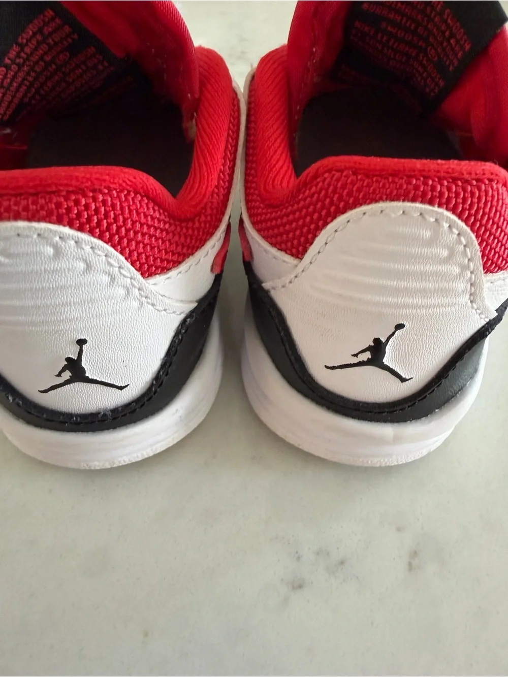 Nike Kids White, Black and Red Sneakers